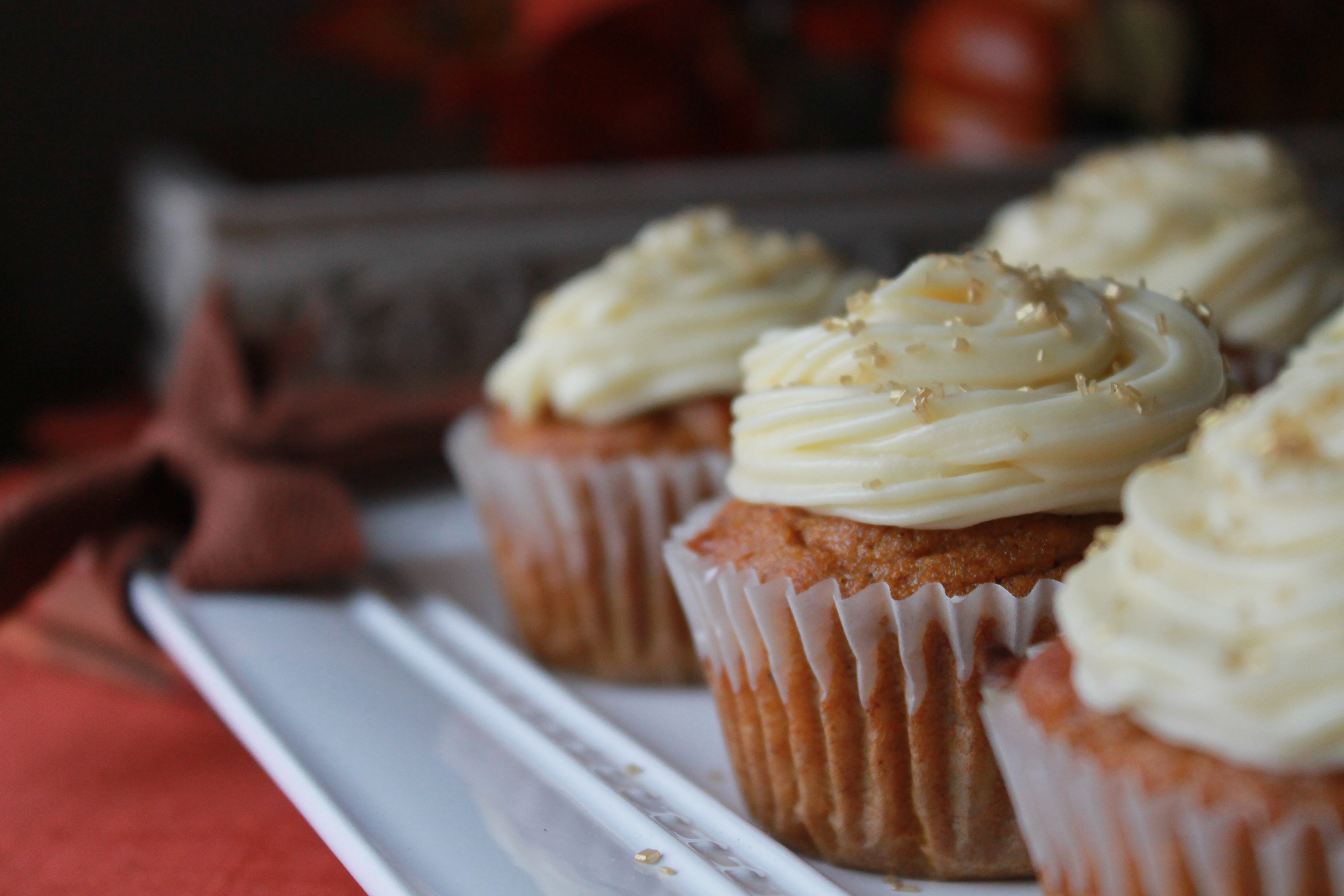 Pumpkin cupcakes with butter cream cheese frosting are the perfect Thanksgiving dessert