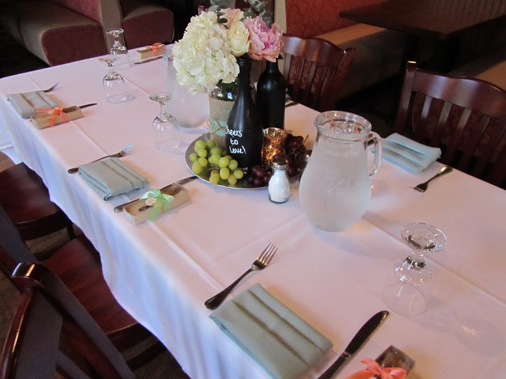 Wine-themed bridal shower guest table centerpieces