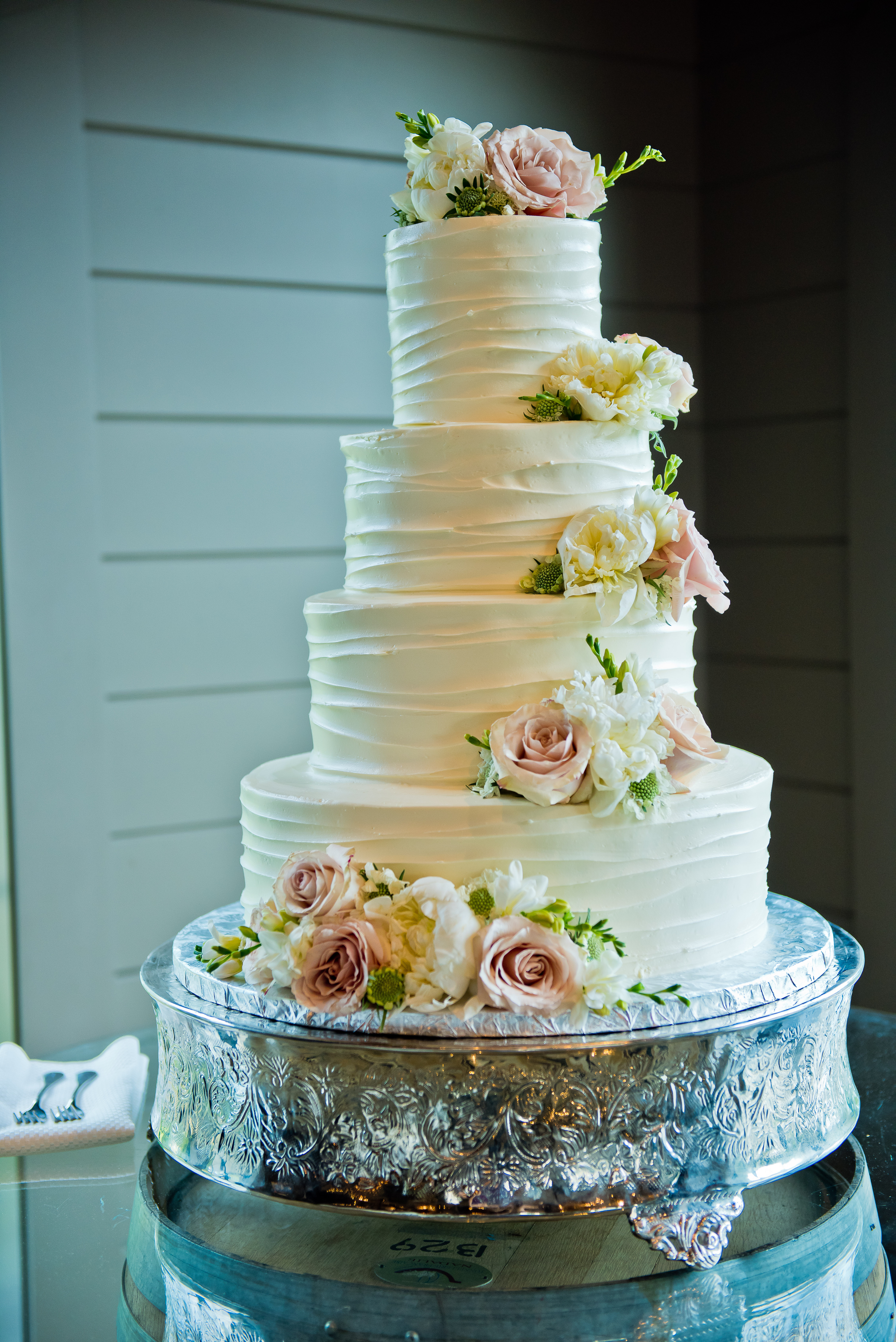 Vineyard summer wedding cake with flowers