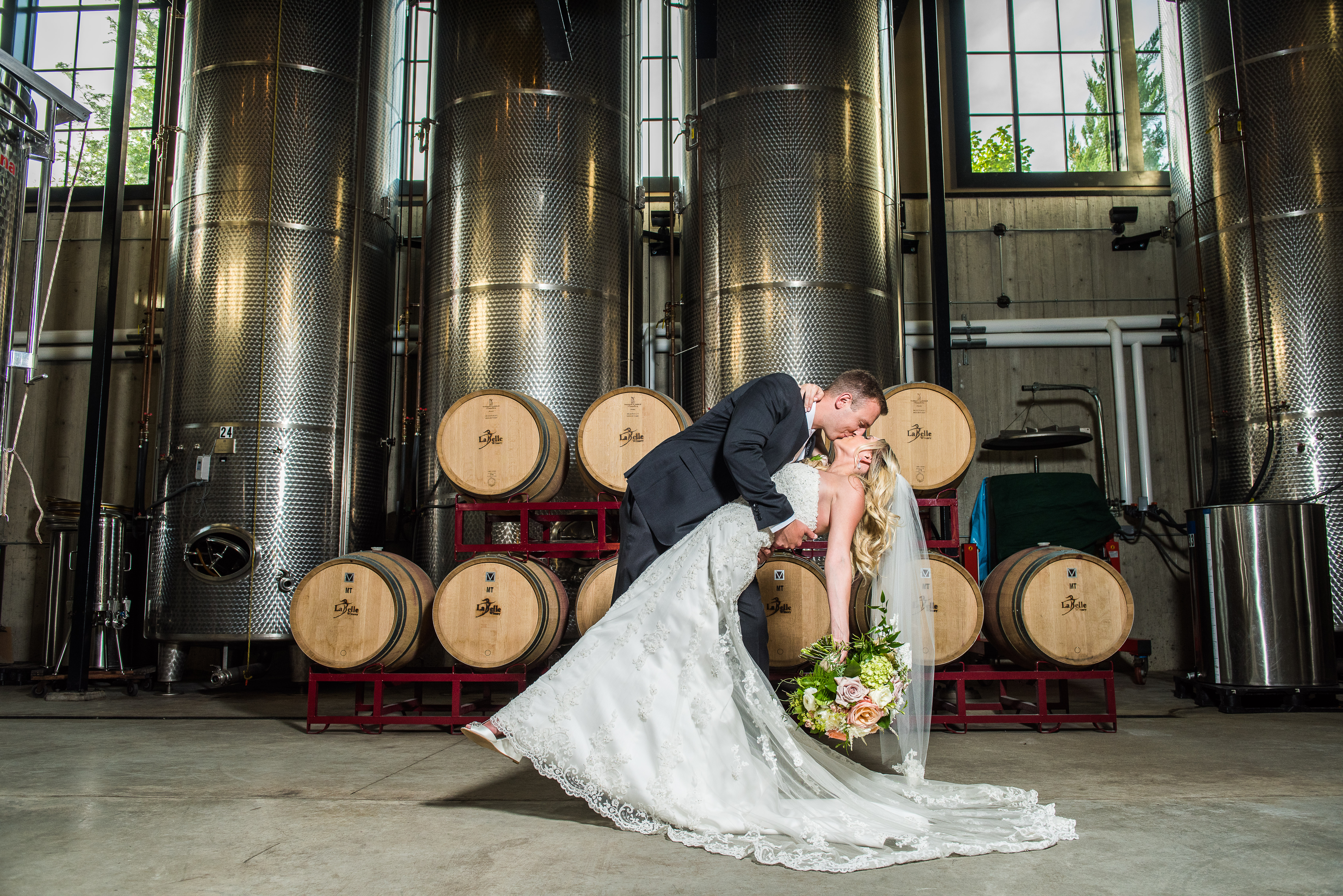 Vineyard wedding bride and groom in wine cellar | Wedding Photography by Marina Zinovyeva