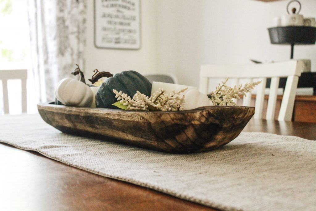 Pumpkins in wooden bowl | Dining Room Reveal via ourlittlehomestyle.com